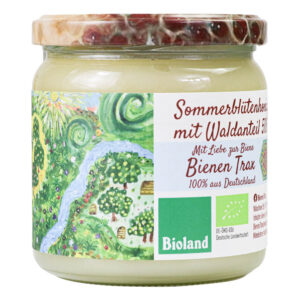 Glas Sommerblütenhonig mit Waldanteil 500g von Bienen Trax, Nahaufnahme des Etiketts „Mit Liebe zur Biene“